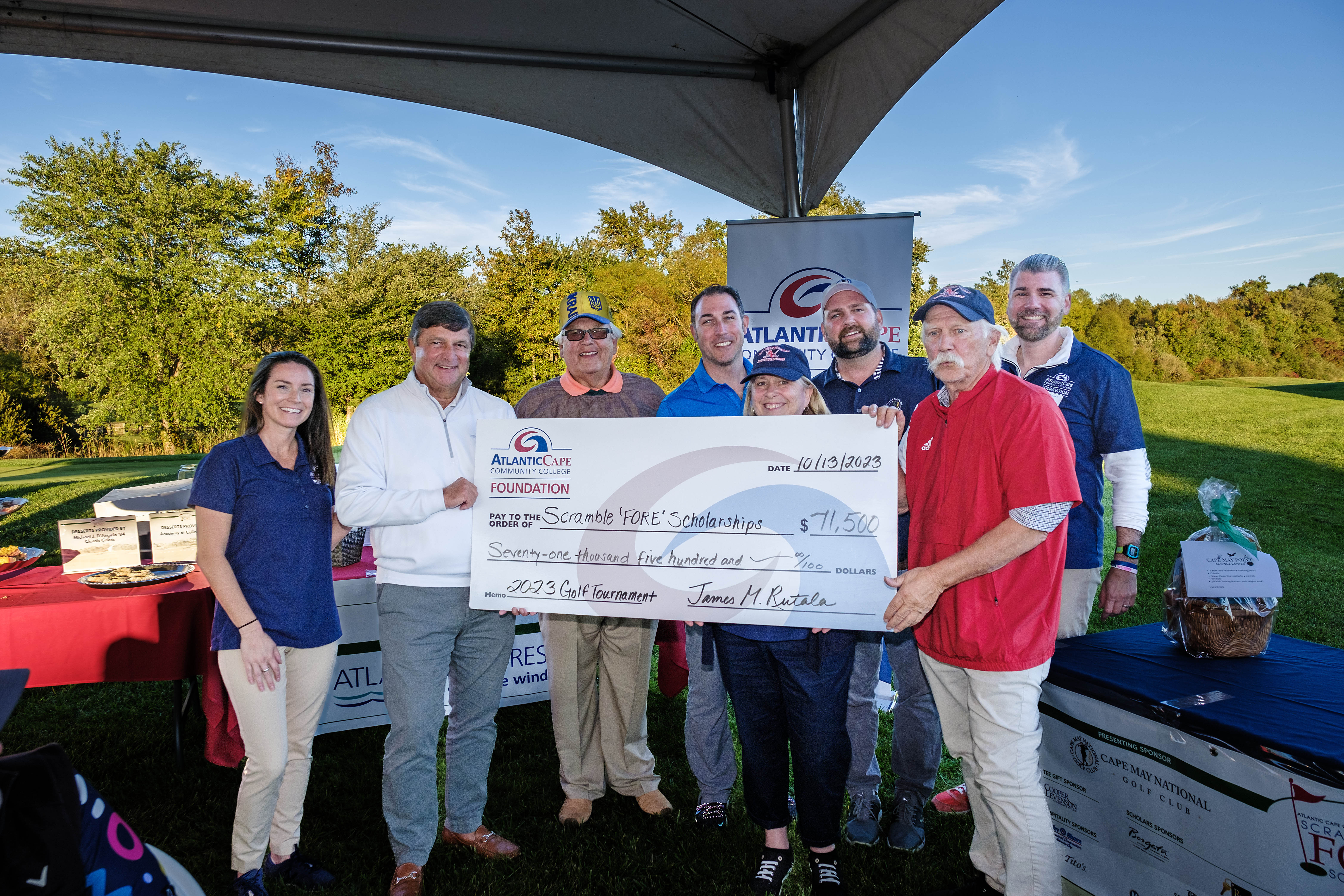 Check presentation at the 2023 golf tournament