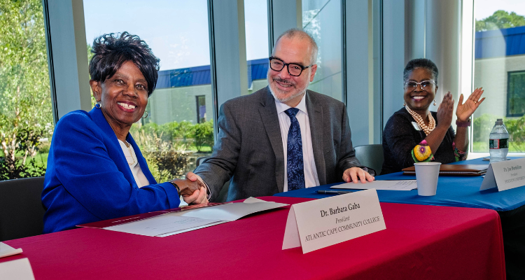 Atlantic Cape President Dr. Barbara Gaba and Stockton University President Dr. Joe Bertolino at the signing ceremony