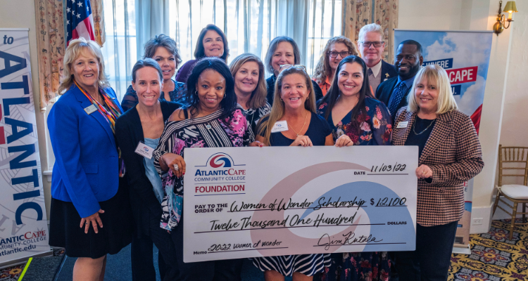 Women of Wonder 2022 check presentation