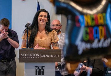 Graduate Amanda Perkins speaks to her fellow graduates and guests in attendance