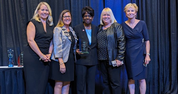 Atlantic Cape's Krista Fitzsimons, Dr. Barbara Gaba and Jean McAlister accept the Betterment Award