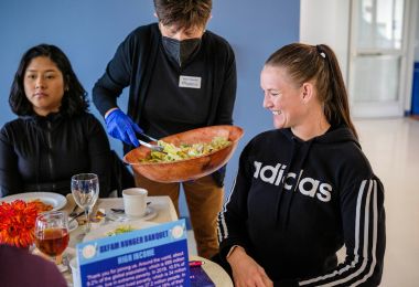 Nadine Hollis Turner being served her salad