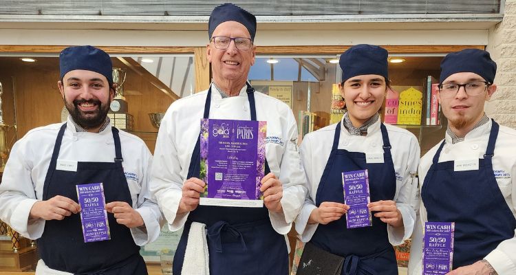 Academy of Culinary Arts students with Restaurant Gala raffle tickets that are now for sale